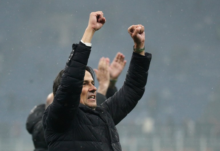 Soccer Football - Serie A - AC Milan v Inter Milan - San Siro, Milan, Italy - April 22, 2024 Inter Milan coach Simone Inzaghi celebrates winning Serie A after the match REUTERS/Alessandro Garofalo