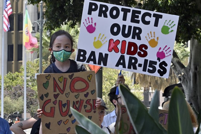 Protestors marched against gun violence at City Hall in Los Angeles in 2022 following an elementary school shooting in Uvalde, Texas, that killed 19 children and two teachers, and other mass shootings. New research shows that a quarter of teachers in the U.S. last year reported a gun-related lockdown in their schools. Photo by Jim Ruymen/UPI