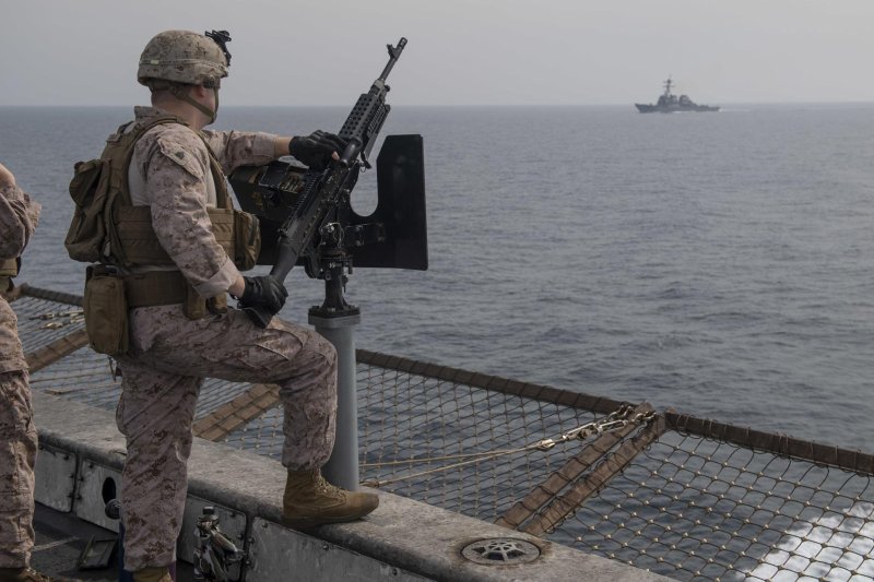 U.S. Marine Sgt. Joseph Graydon is shown standing security watch aboard the USS San Diego in the Strait of Hormuz on Feb. 19, 2021. Iranian media reported Saturday the country's military has seized a Portuguese-flagged cargo ship it claims is linked to Israel. U.S. Navy Photo by Mass Communication Specialist 2nd Class Brandon Woods