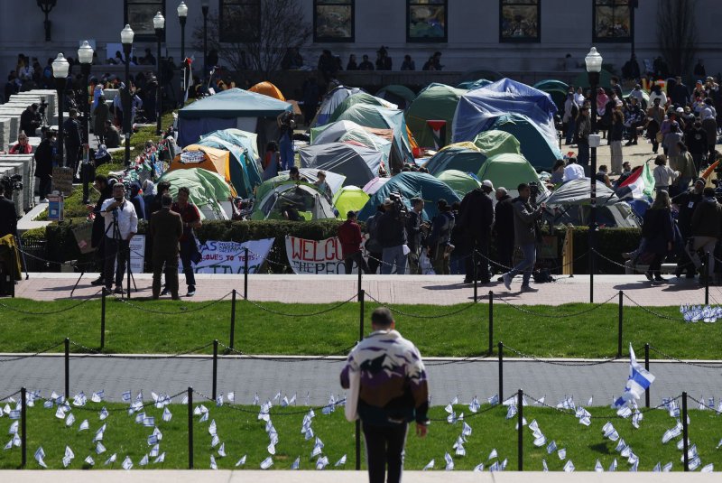 Israeli flags fill a patch of grass near the Pro-Palestinian encampment on the grounds of Columbia University in New York on Friday. On Monday, the university's president said Columbia failed to reach an agreement with protesters. Photo by John Angelillo/UPI