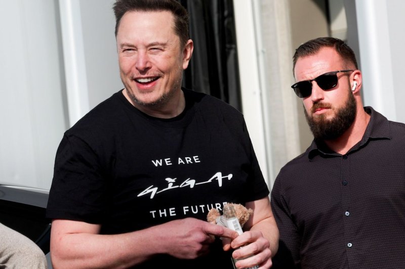 Tesla CEO Elon Musk (L) visits the Tesla electric car plant in Gruenheide near Berlin, Germany, in March. Musk on Friday posted on X that Tesla would be ready to reveal the Robotaxi autonomous rideshare program on Aug. 8. Photo by Filip Singer/EPA-EFE