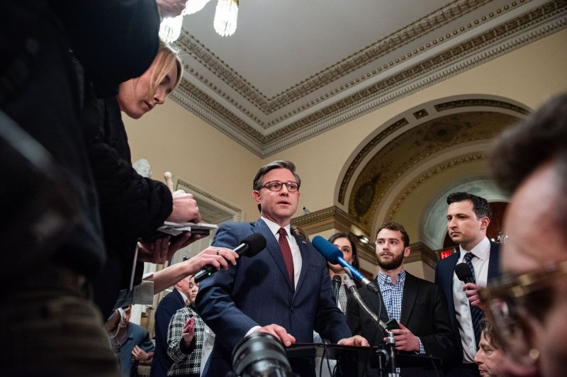 Speaker of the House Mike Johnson, R-La., speaks to reporters Saturday after the House passed a long-sought $95 billion foreign aid package for Ukraine, Israel and Taiwan. Photo by Annabelle Gordon/UPI