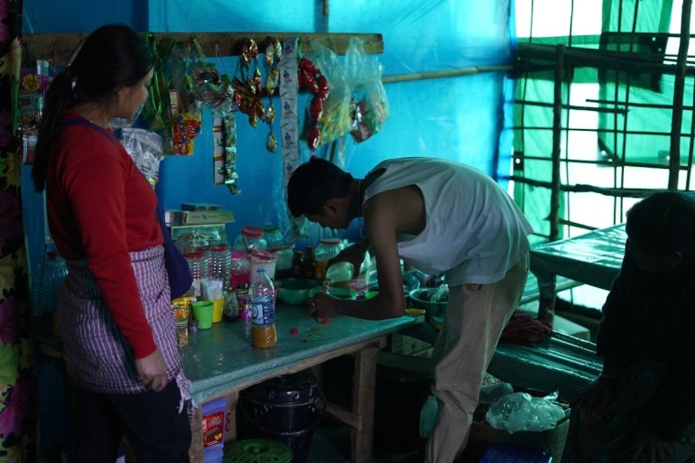 general makeshift store run by a refugee in Zokhawthar town