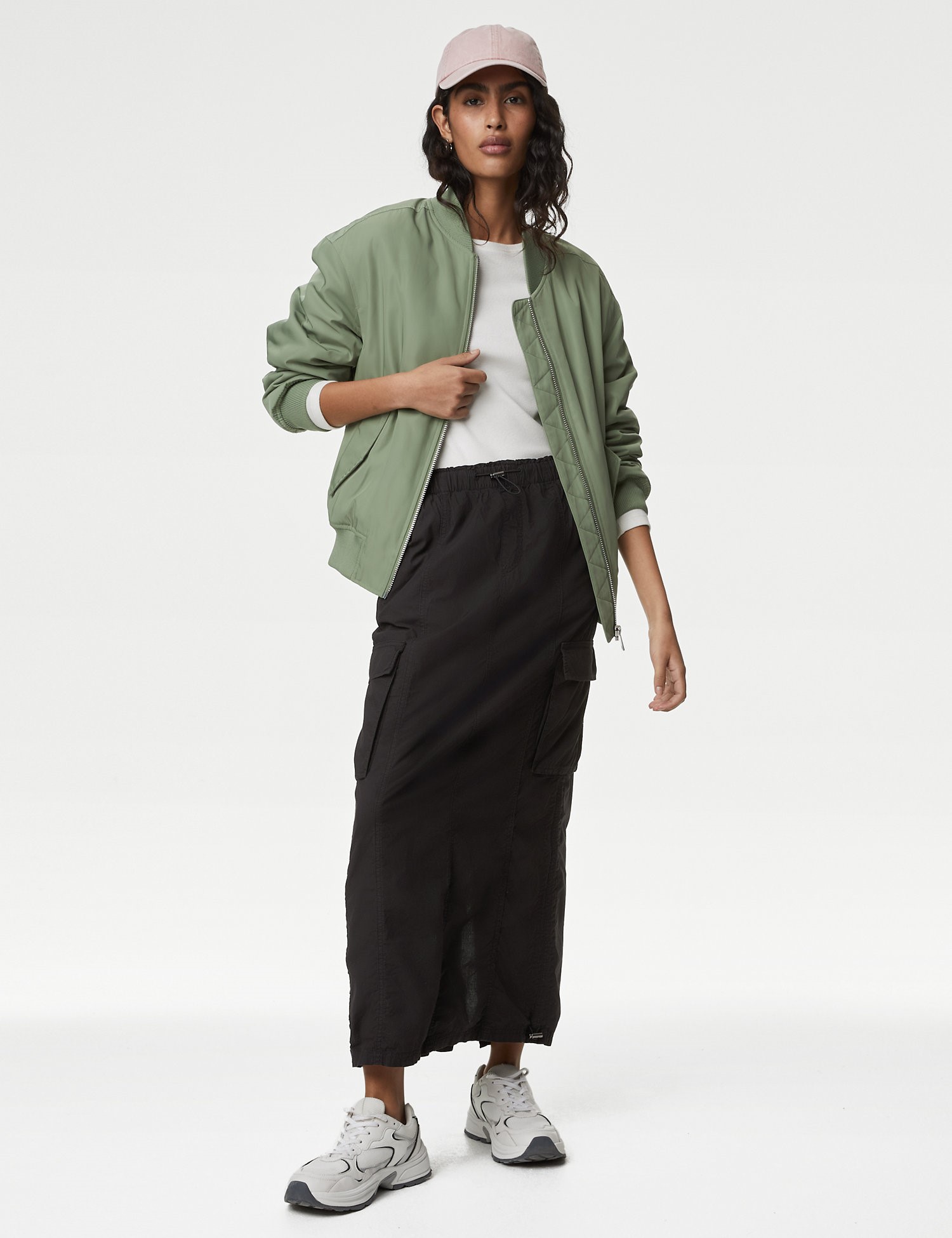 M&S has paired the skirt with trainers and a bomber for a casual but cool look