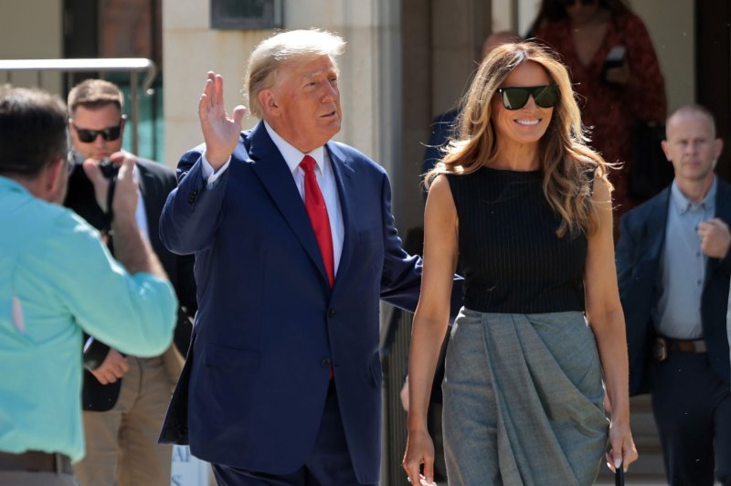 Former President Donald Trump and former first lady Melania Trump greet friends after voting in 2022. Melania Trump has largely stayed out of the public eye during her husband's campaign for re-election. File Photo by Gary I Rothstein/UPI