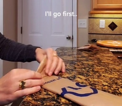 A cleaning fan shared a hack that cleared up clutter in her cabinets