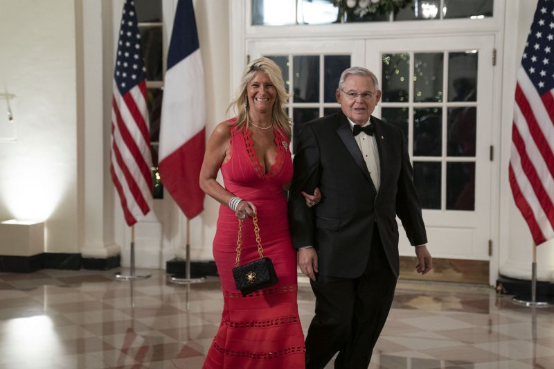 Bob Menendez, D-N.J, and Nadine Menendez arrive to attend a State Dinner in honor of President Emmanuel Macron at the White House in Washington, D.C. on Dec. 1, 2022. On Thursday, Nadine Menendez asked a district judge to delay the start of her bribery trial due to a medical condition that requires surgery. File Photo by Sarah Silbiger/UPI