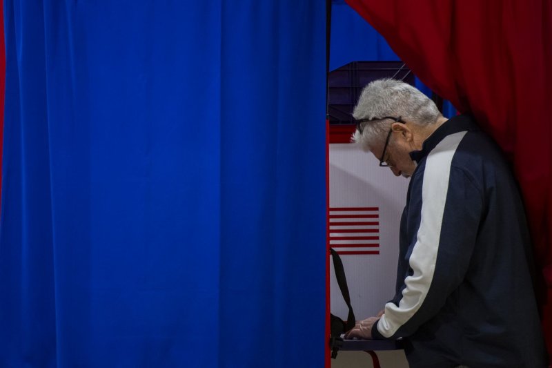 Voters cast their ballots in the New Hampshire Primary at a voting site at Pinkerton Academy in Derry, N.H., on Jan. 23. File Photo by Amanda Sabga/UPI