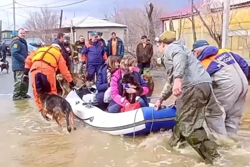 Rescue workers evacuate residents of Orsk, Russia, on Saturday after a dam burst near the city. Water from the Ural River had flooded around 2,400 homes in the area around the border with Kazakhstan. Photo courtesy Russian Ministry of Emergency Situations/Telegram