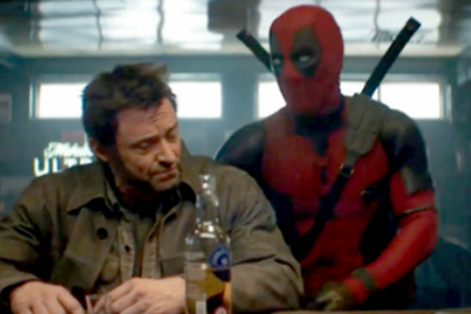 Ryan Reynolds, right, stars as Deadpool alongside Hugh Jackman in the new film