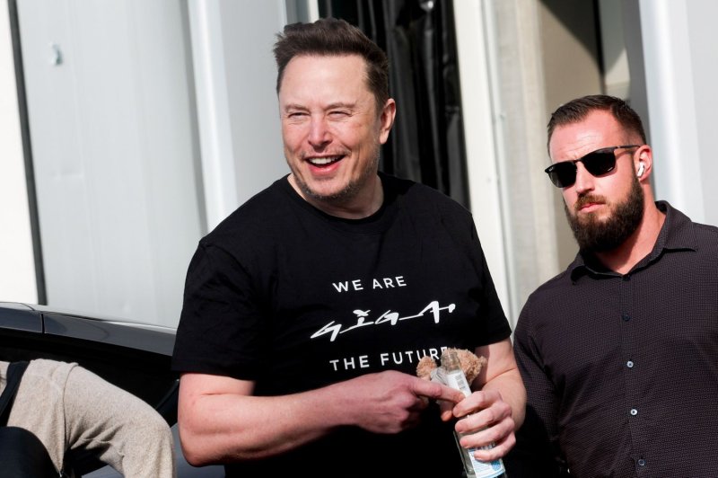 Tesla CEO Elon Musk visits the company's gigafactoy in Gruenheide near Berlin in March as production resumed. The company blamed a shutdown at the plant along with global supply issues and competition from hybrids for a more than 50% drop first quarter profit. Photo by Filip Singer/EPA-EFE