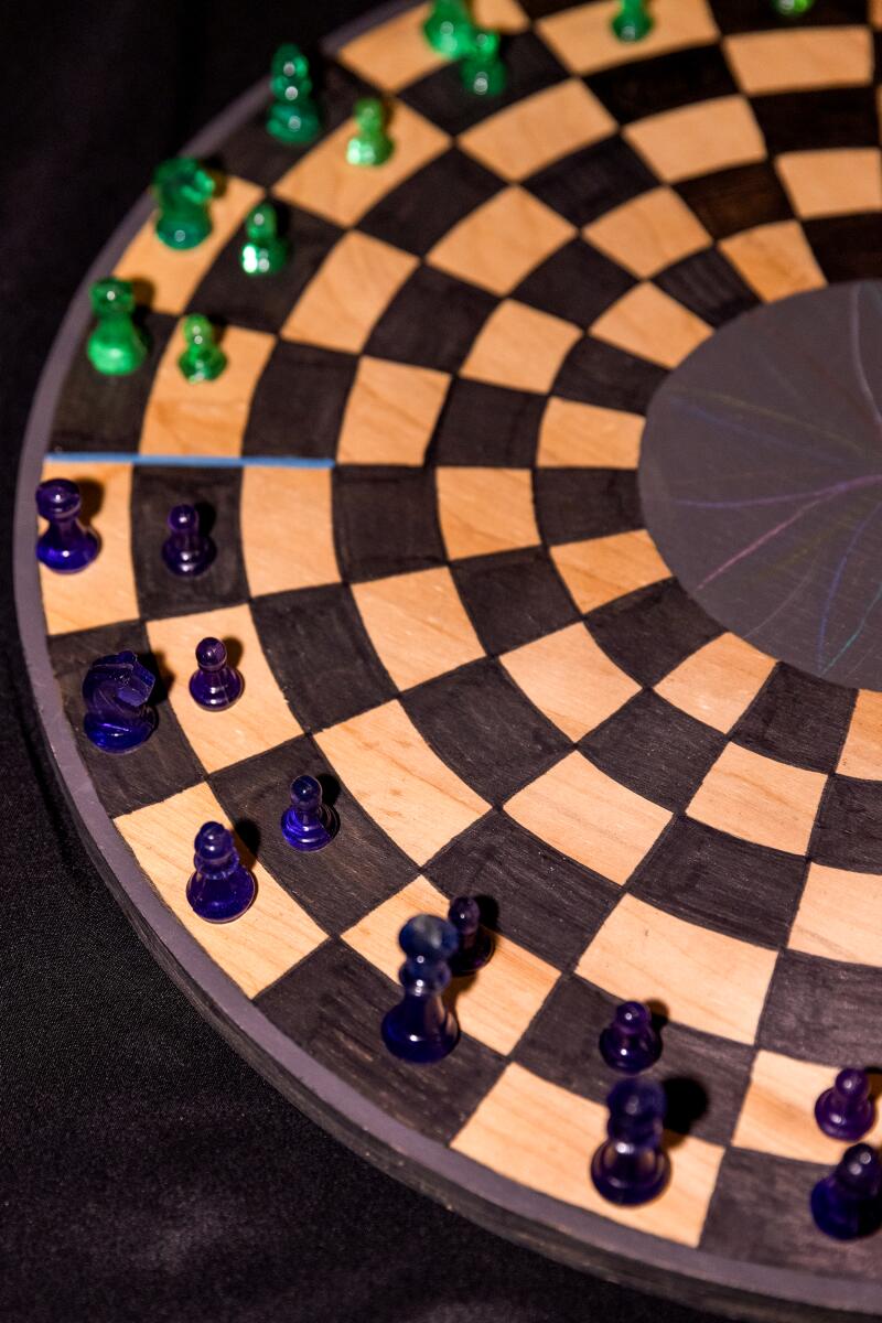 A detail of a circular chess board.