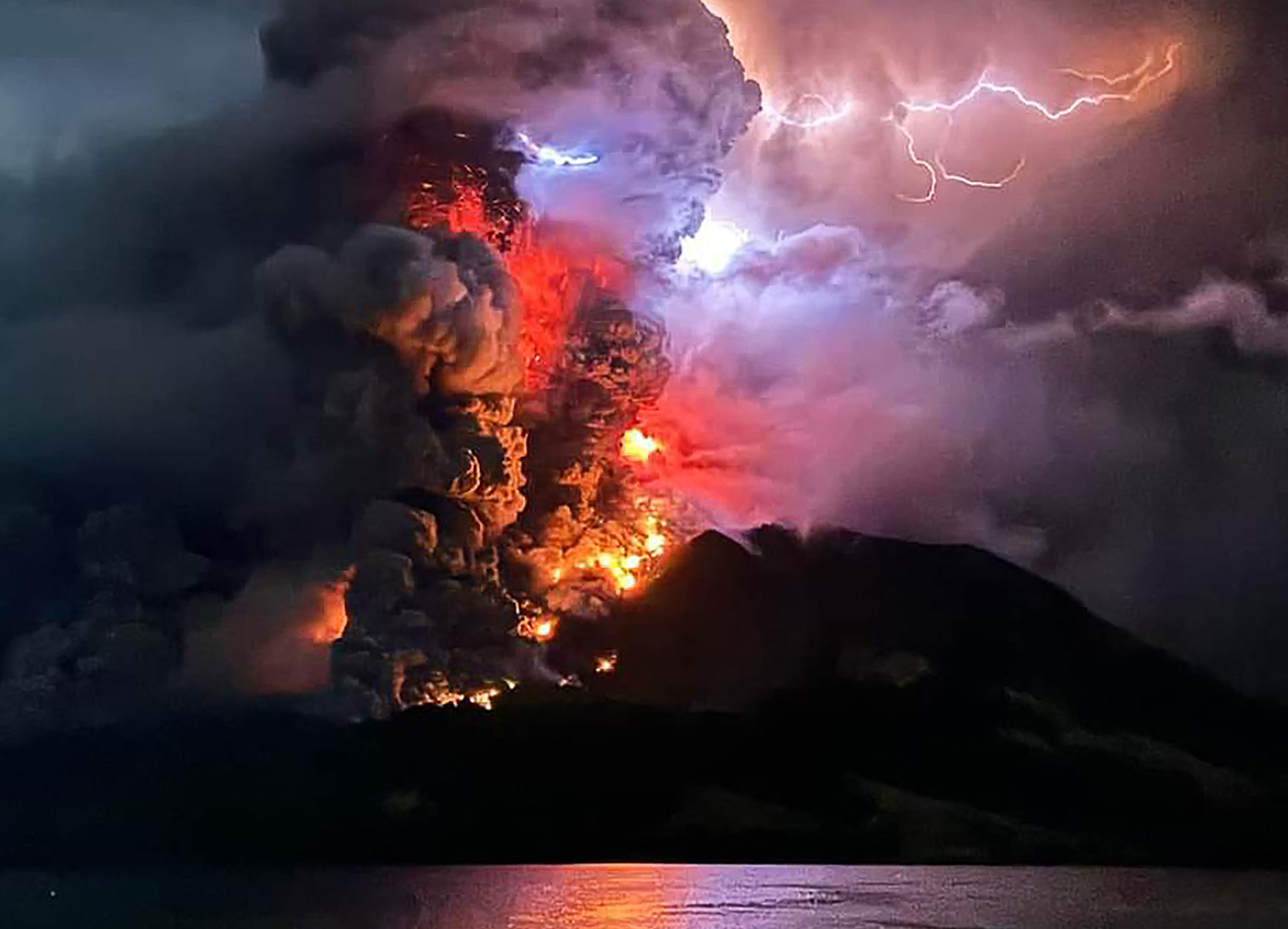 Dramatic pictures showed red smoke, flames and lightning fill the sky