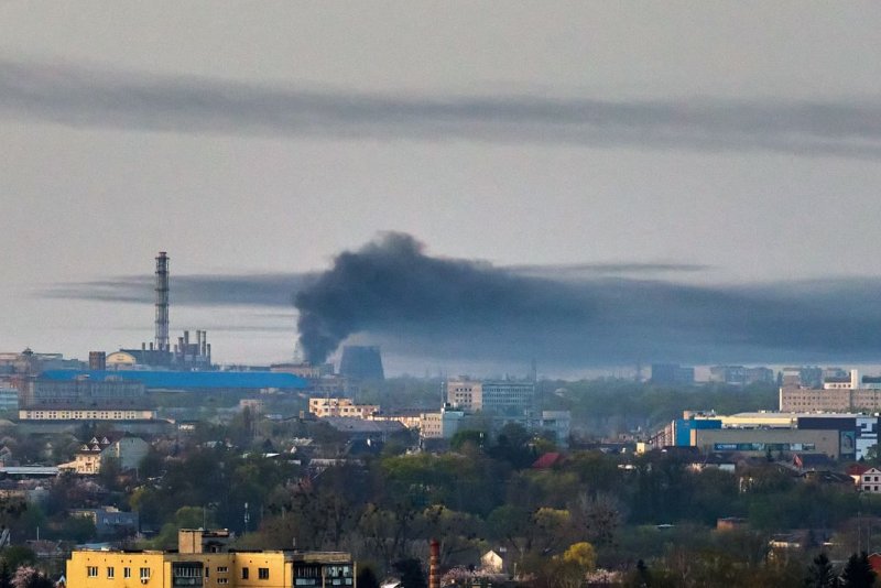 A cloud of smoke rises above a site following a rocket attack in Kharkiv, northeastern Ukraine, amid the Russian invasion. Ukrainian Armed Forces Commander in Chief Oleksandr Syrskyi on Saturday warned Russia has re-upped its offensive in multiple locations on the eastern front. Photo by Sergey Kozlov/EPA-EFE