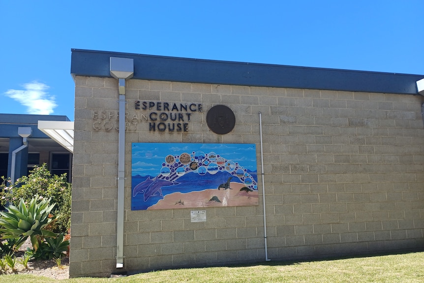 A squat, brick building bearing the lettering "Esperance Court House".