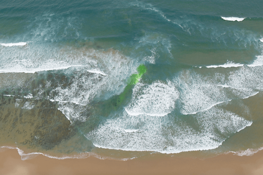 An aerial shot of a shoreline.