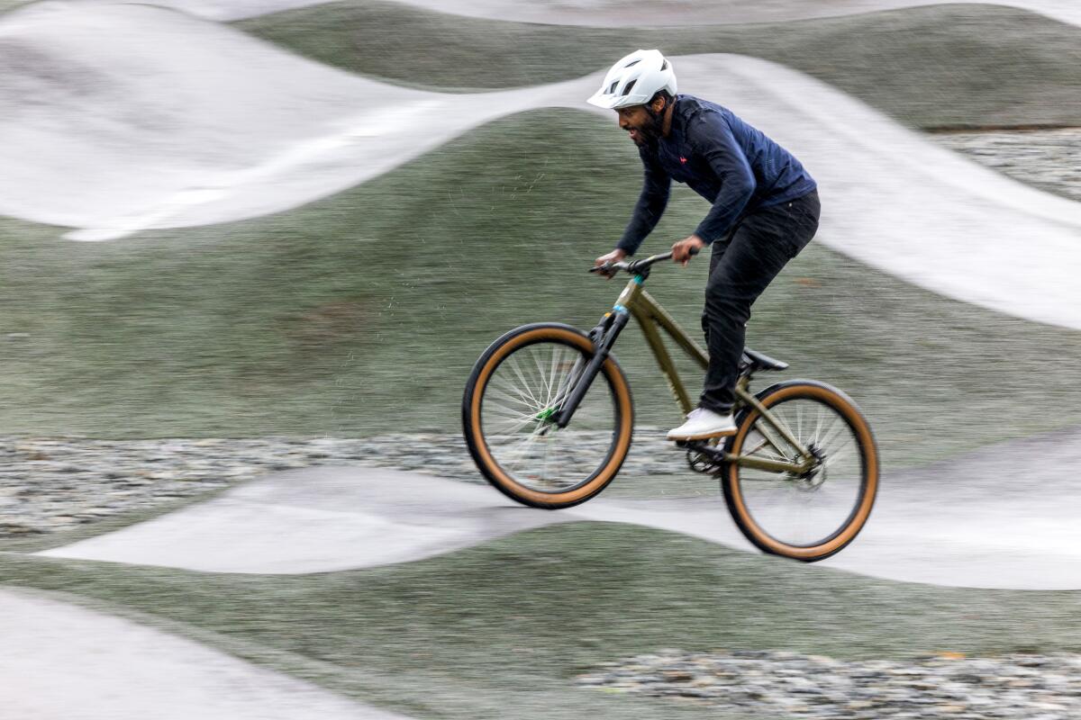 Eliot Jackson, a pro mountain biker, showcases his skills at the Inglewood Pumptrack.