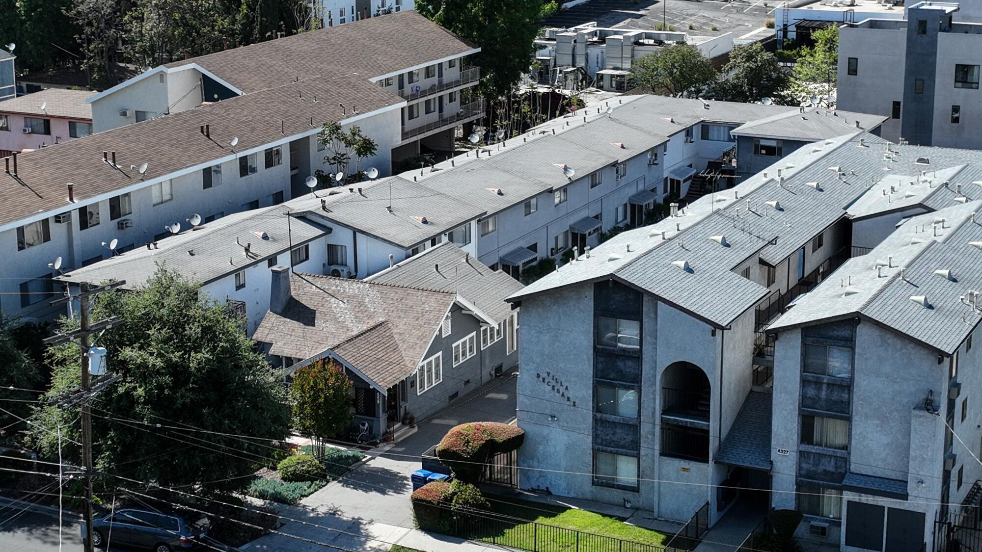 A developer is looking to demolish 17 apartments on Toland Way, second row from left, in Eagle Rock.