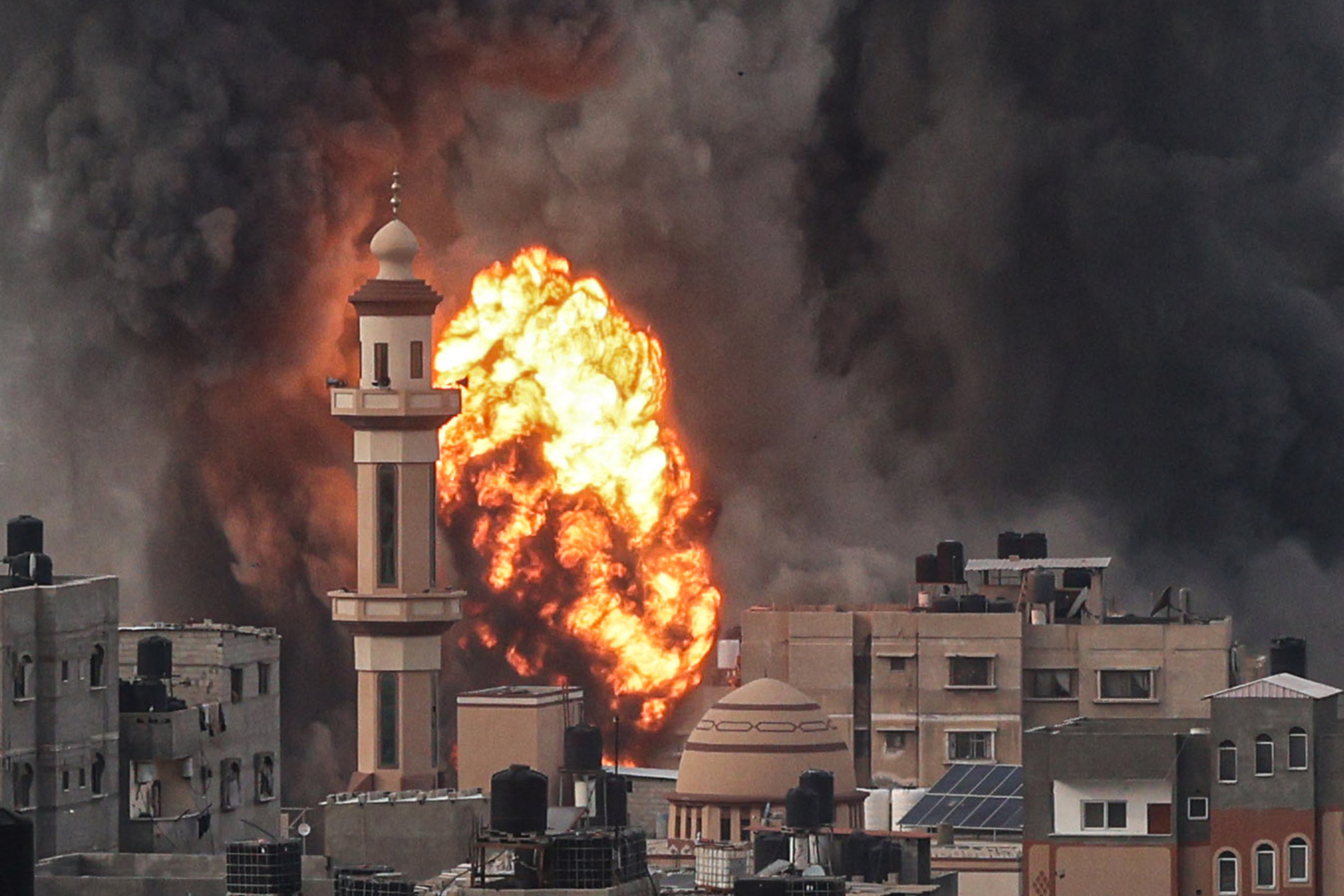 A fireball erupts after an Israeli strike over Rafah in the southern Gaza Strip