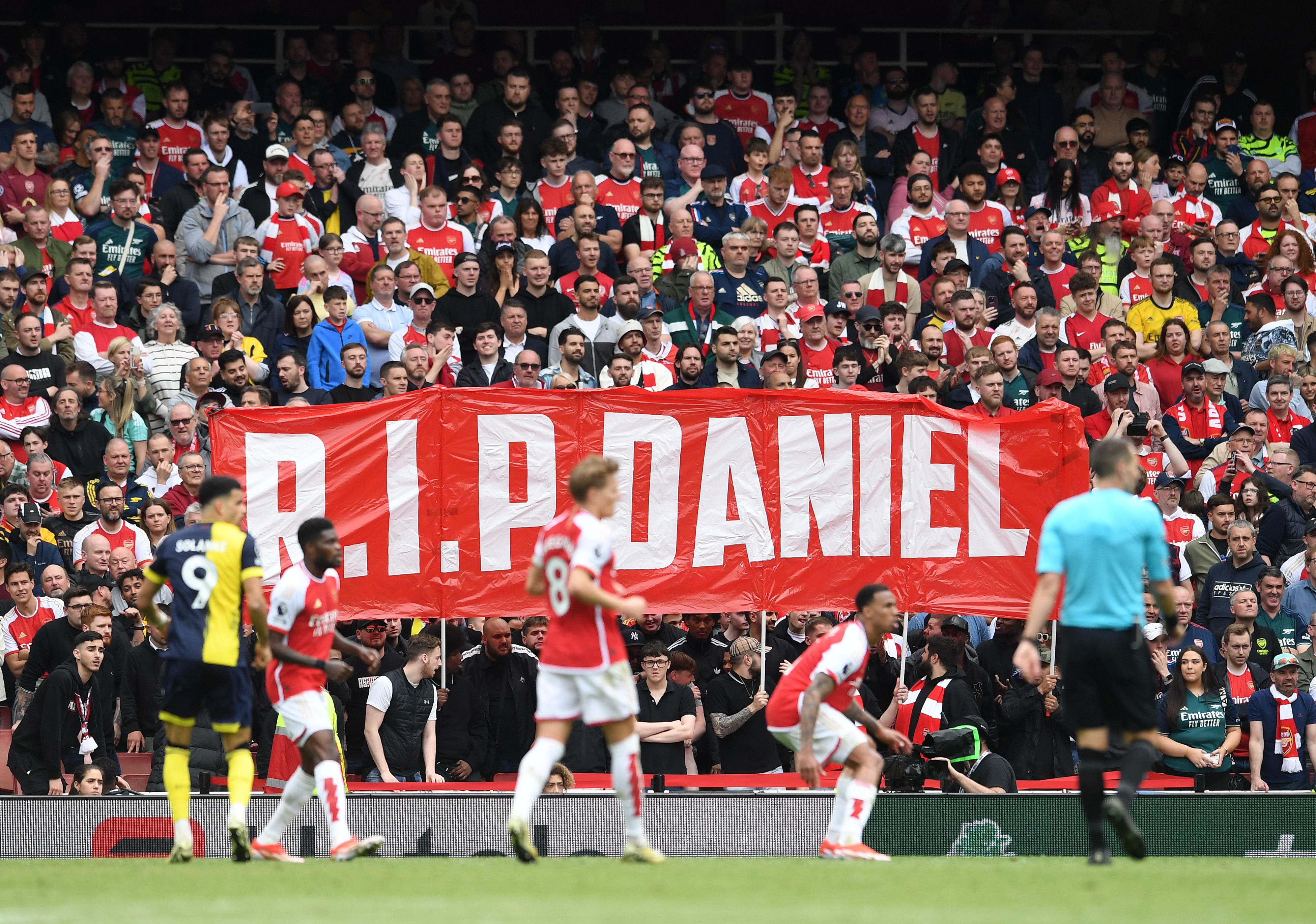 Arsenal fans held a minute's applause for the footie-mad youngster on Saturday