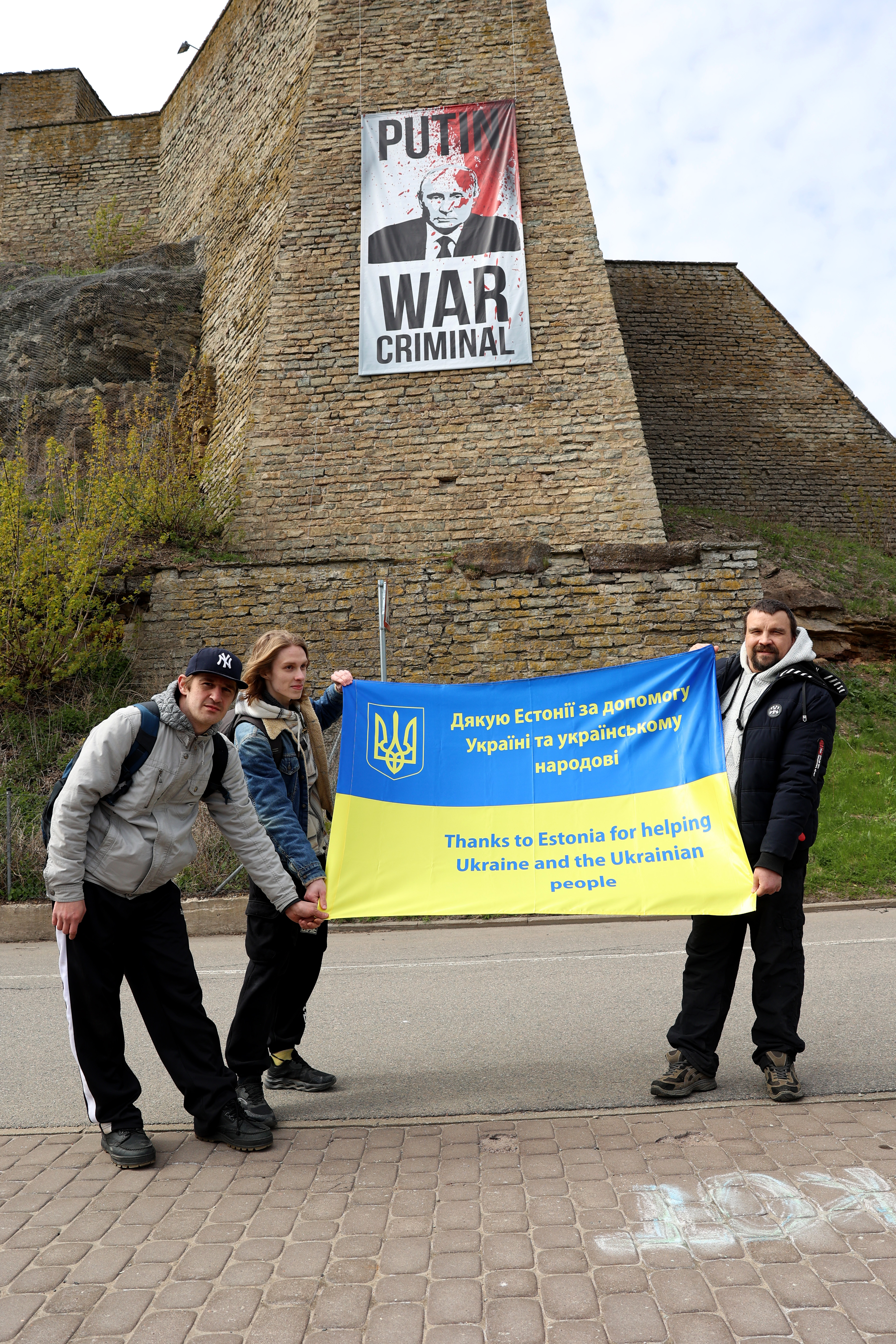 Aleksei Mehailainen who was holding the Ukrainian flag was urged to be careful