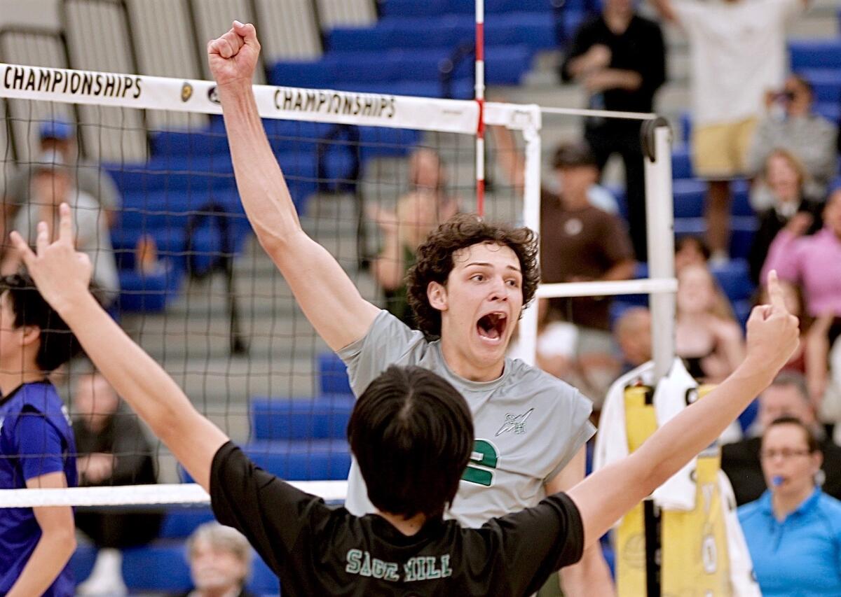 Jackson Cryst celebrates his kill on match point that lifted Sage Hill to a five-set victory over San Marino.