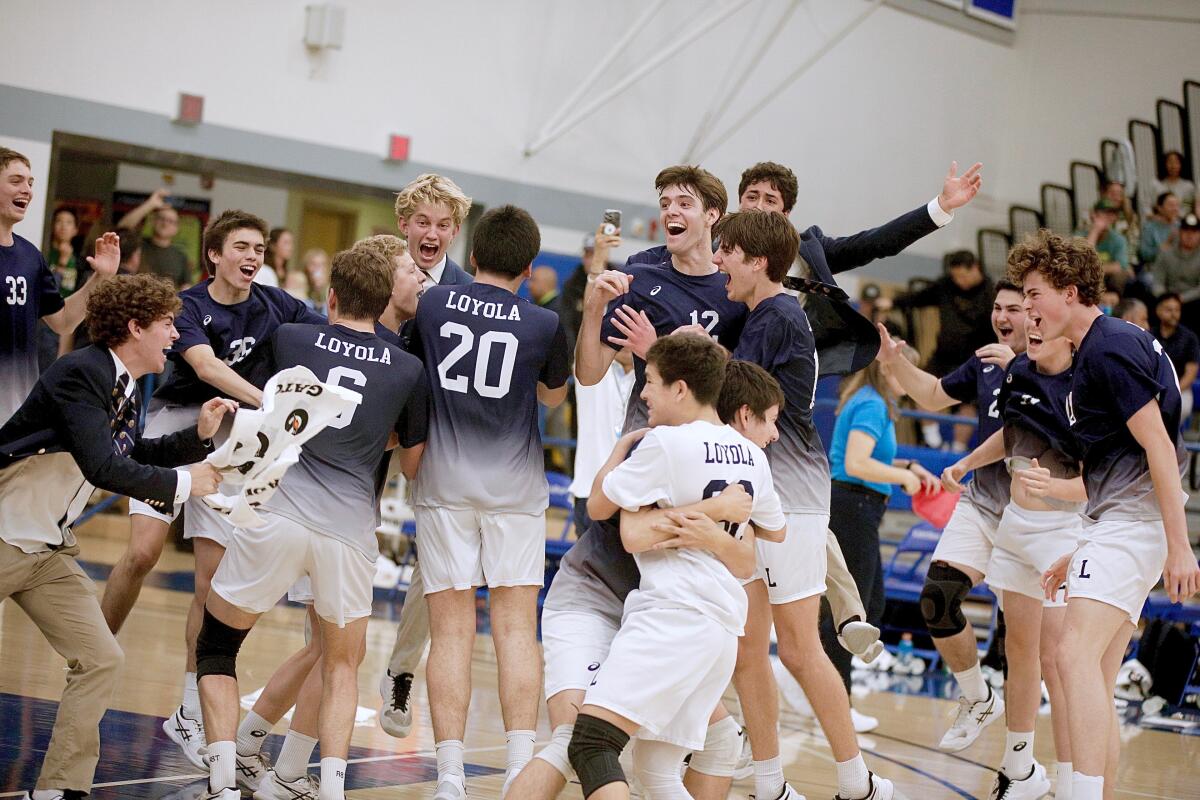 Loyola players celebrate after beating Mira Costa Saturday in the Southern Section Division 1 final Saturday.