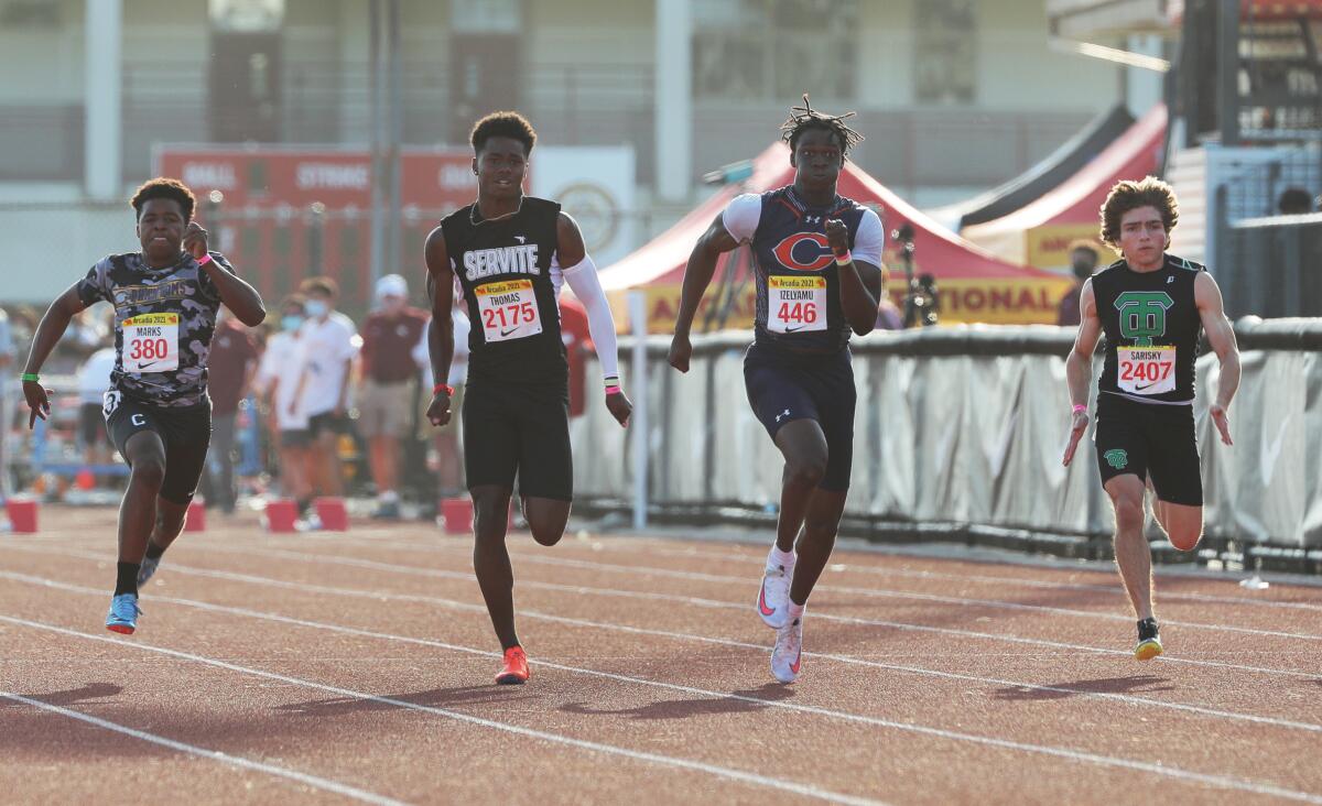 Chaminade's Patrick Ize-Iyamu Jr win the 100 at Arcadia Invitational in 2021.