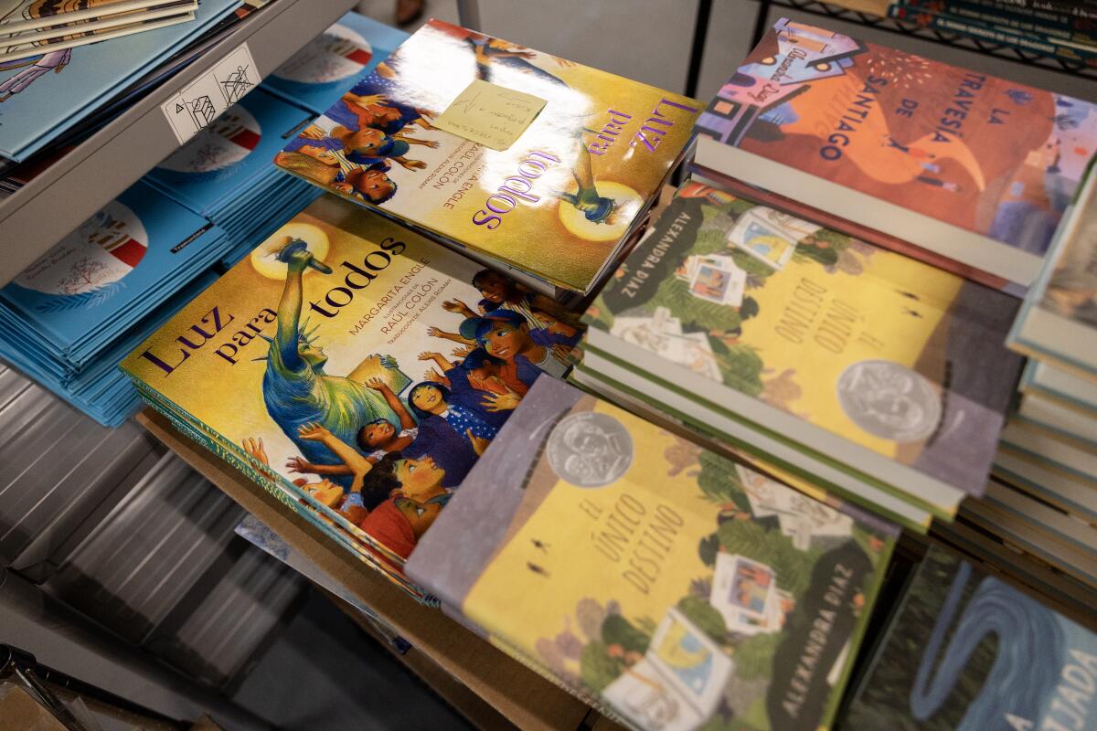 An overhead photo of stacks of books.