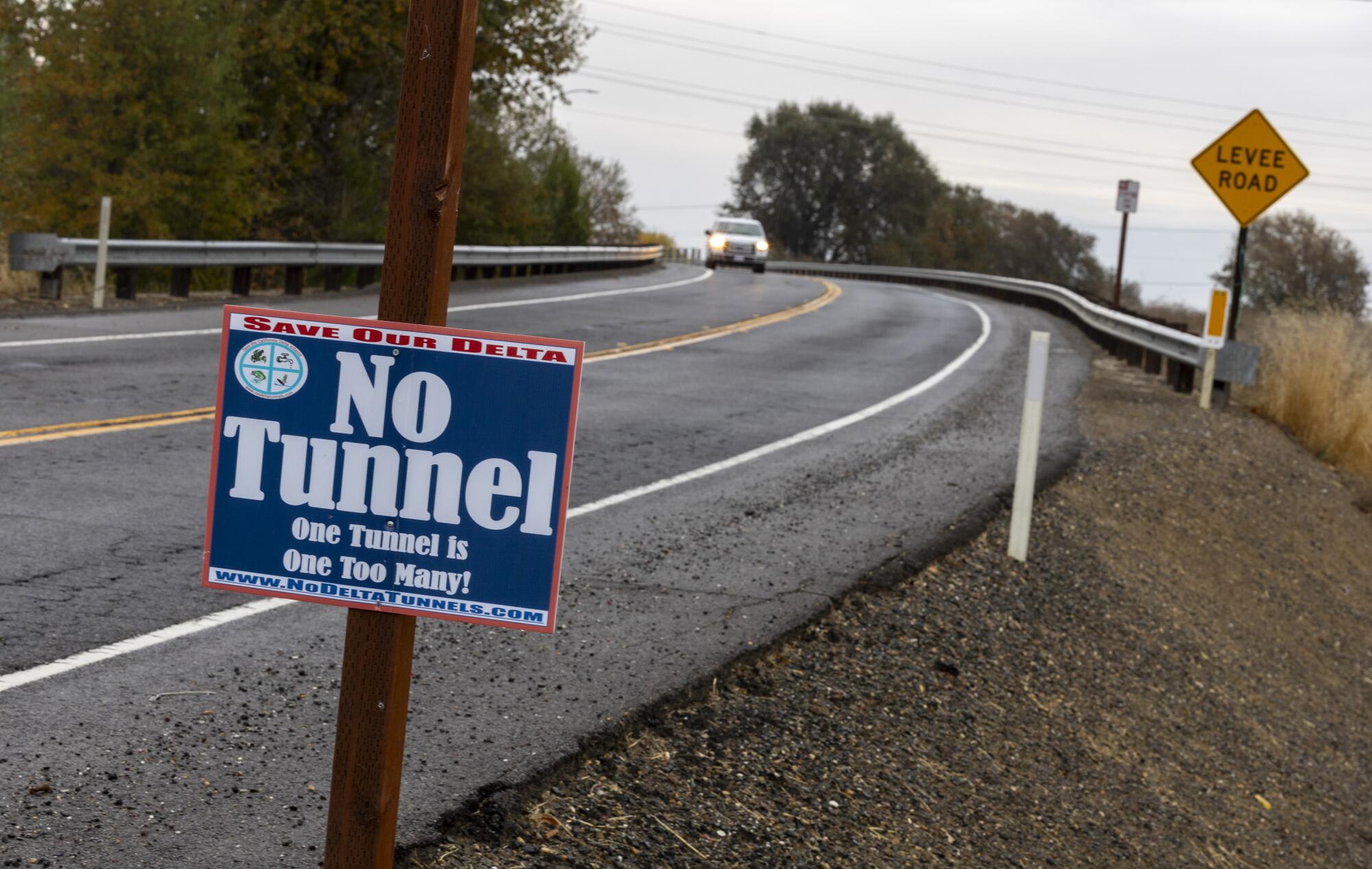 A sign of opposition to the Delta Conveyance Project along a levee road near the Sacramento River in Hood.