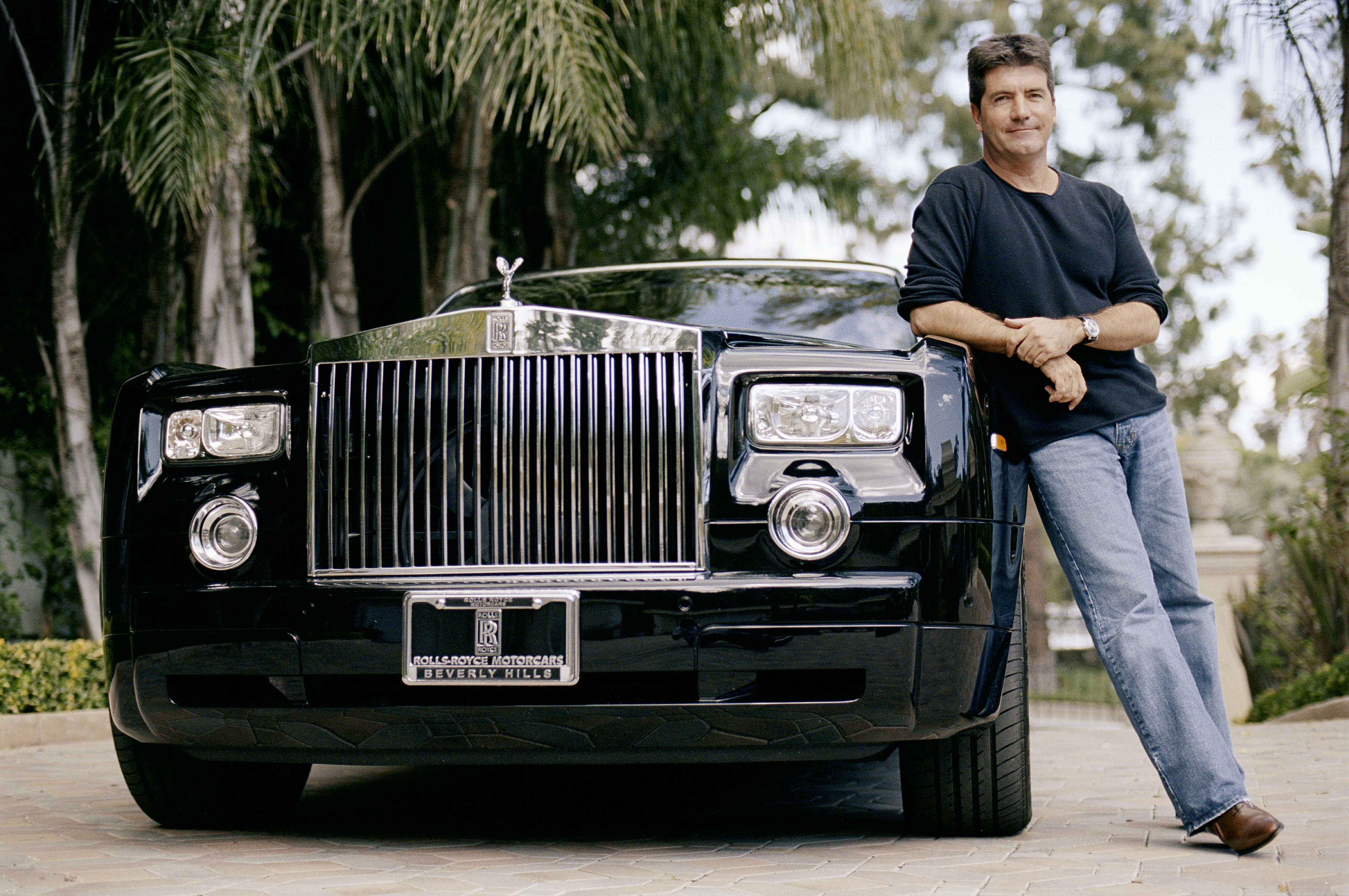 Cowell next to his Rolls Royce