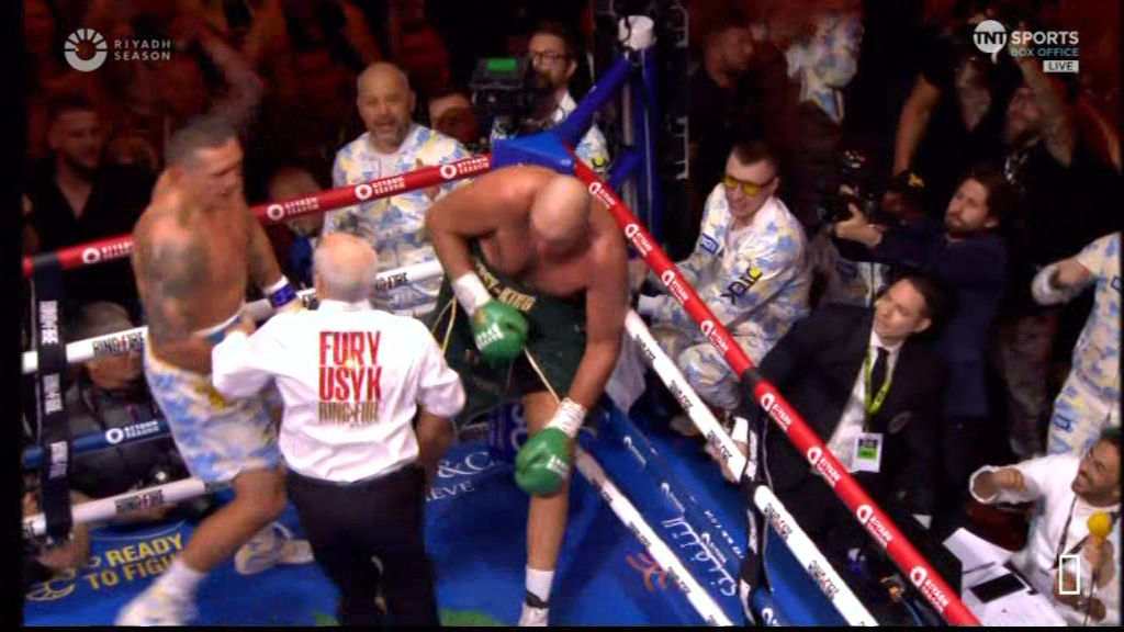 Tyson Fury is saved from being knocked out by the referee