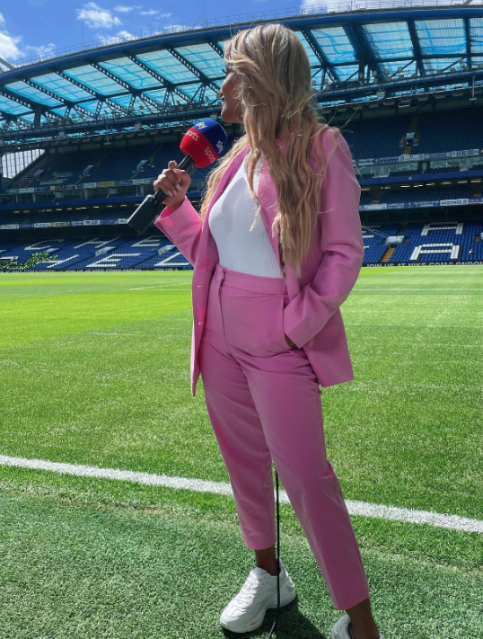 Melissa wowed in pink while presenting the game at Stamford Bridge