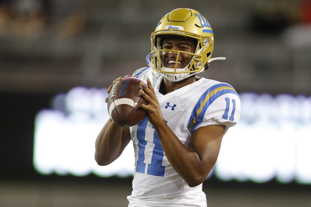 UCLA quarterback Chase Griffin smiles before a game against Arizona in September 2019.