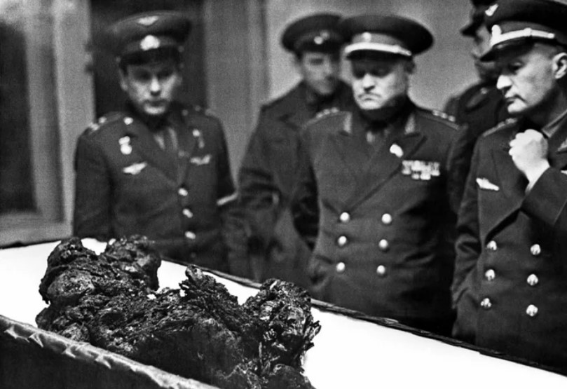 Vladimir Komarov’s charred remains were shown in an open casket after his tragic death