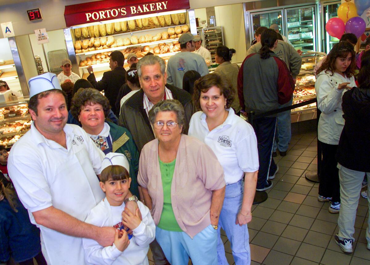 From left: Raul R Porto, son Adrian, 9, Betty Porto–Kawabata, patriarch Raul. E Porto, wife Rosa, and Margarita Navarro