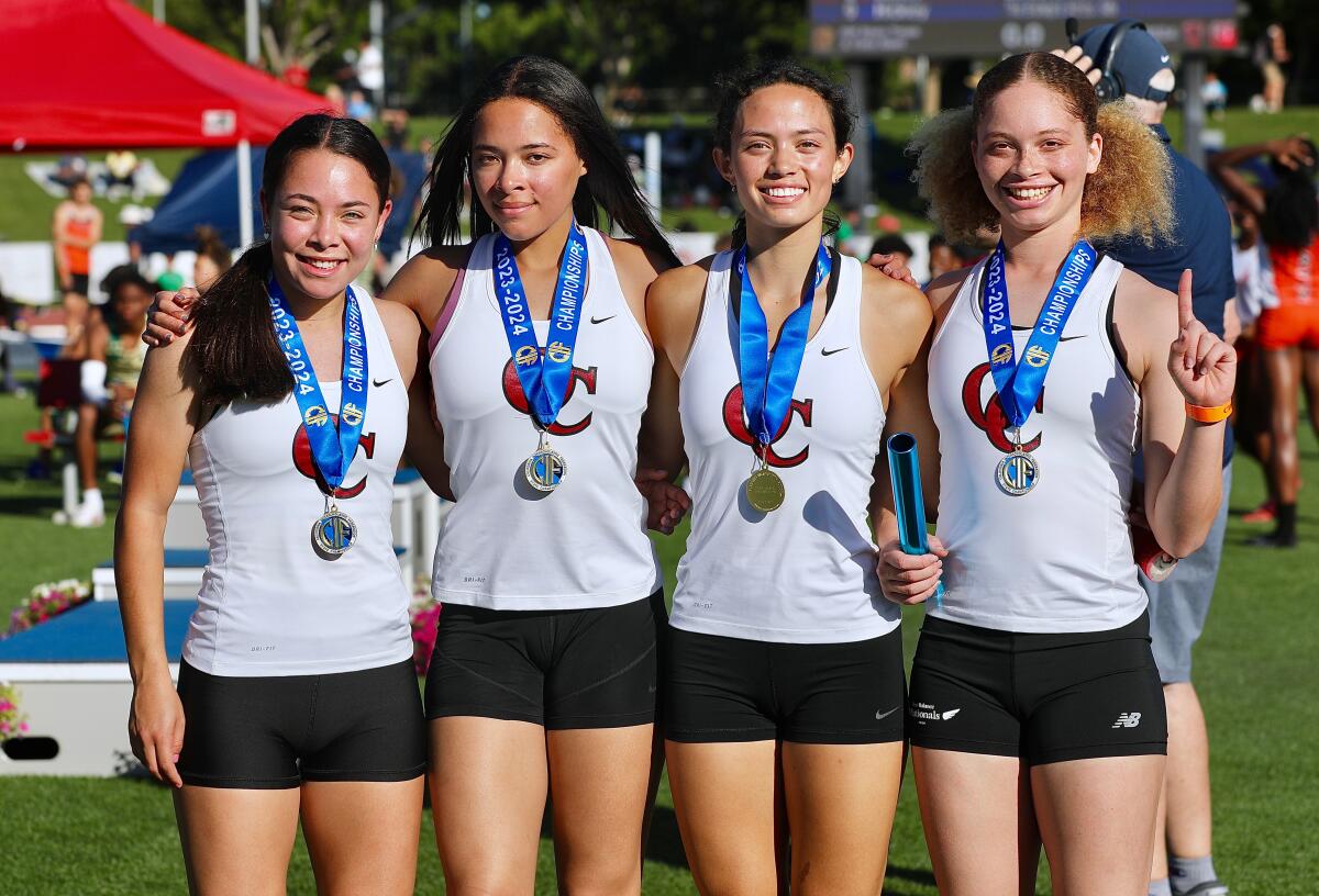 Oaks Christian celebrates its state title in the girls' 4X100-meter relay.