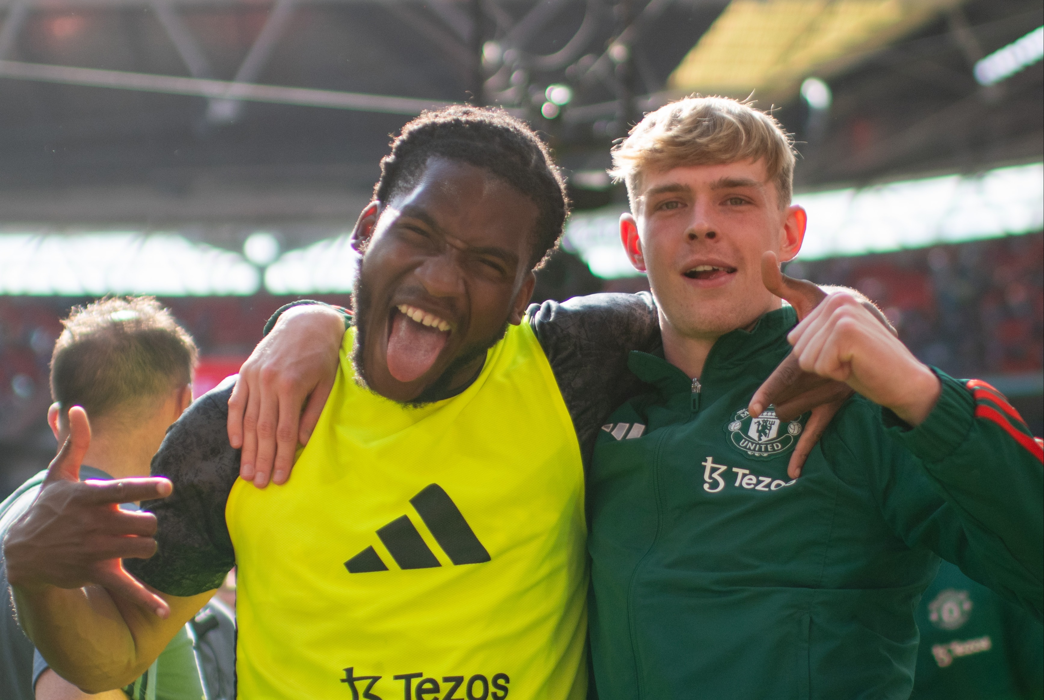 The Under-21s star, right, was on the pitch celebrating at the end of the match