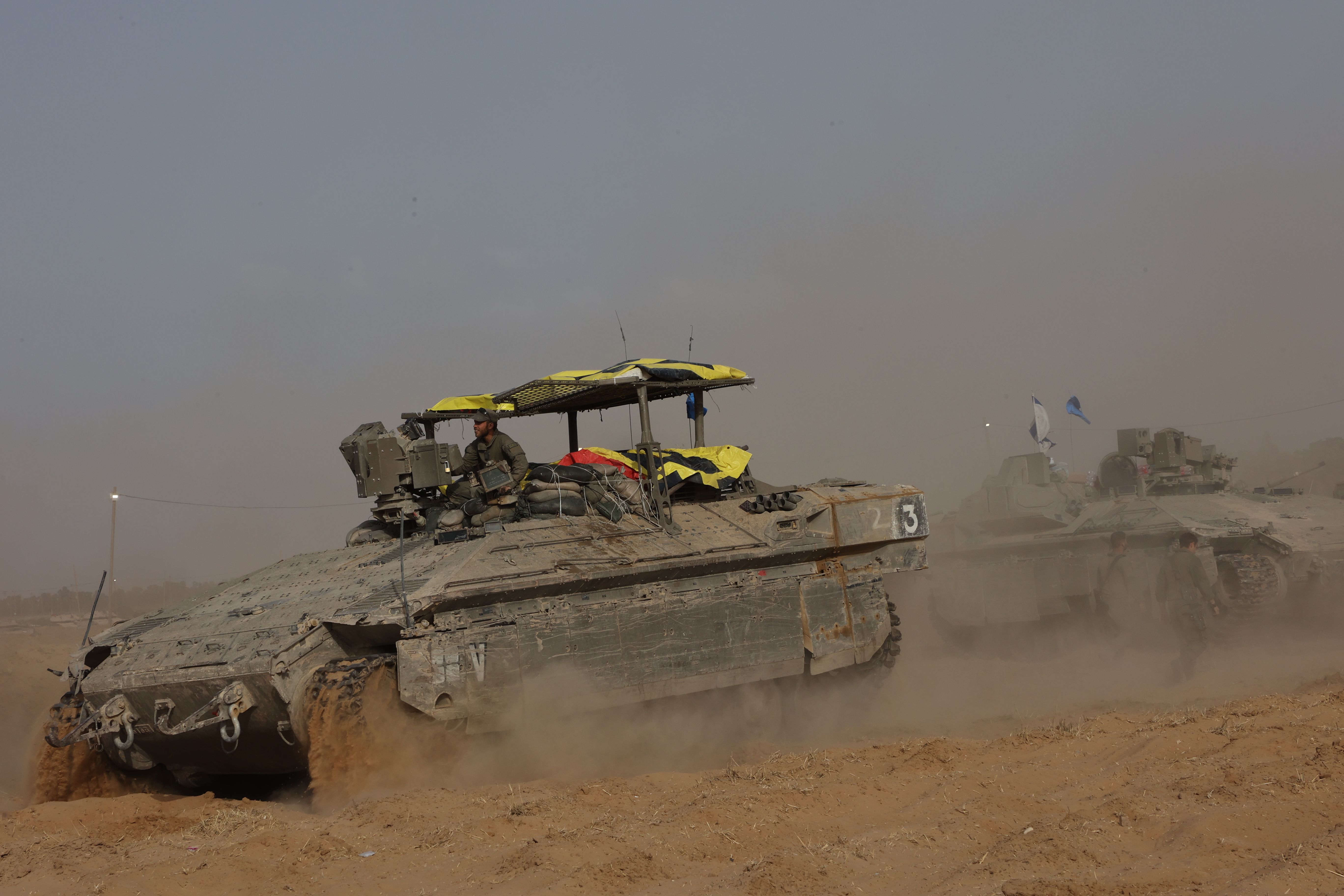 Israeli troops are seen near the border with Gaza Strip in southern Israel