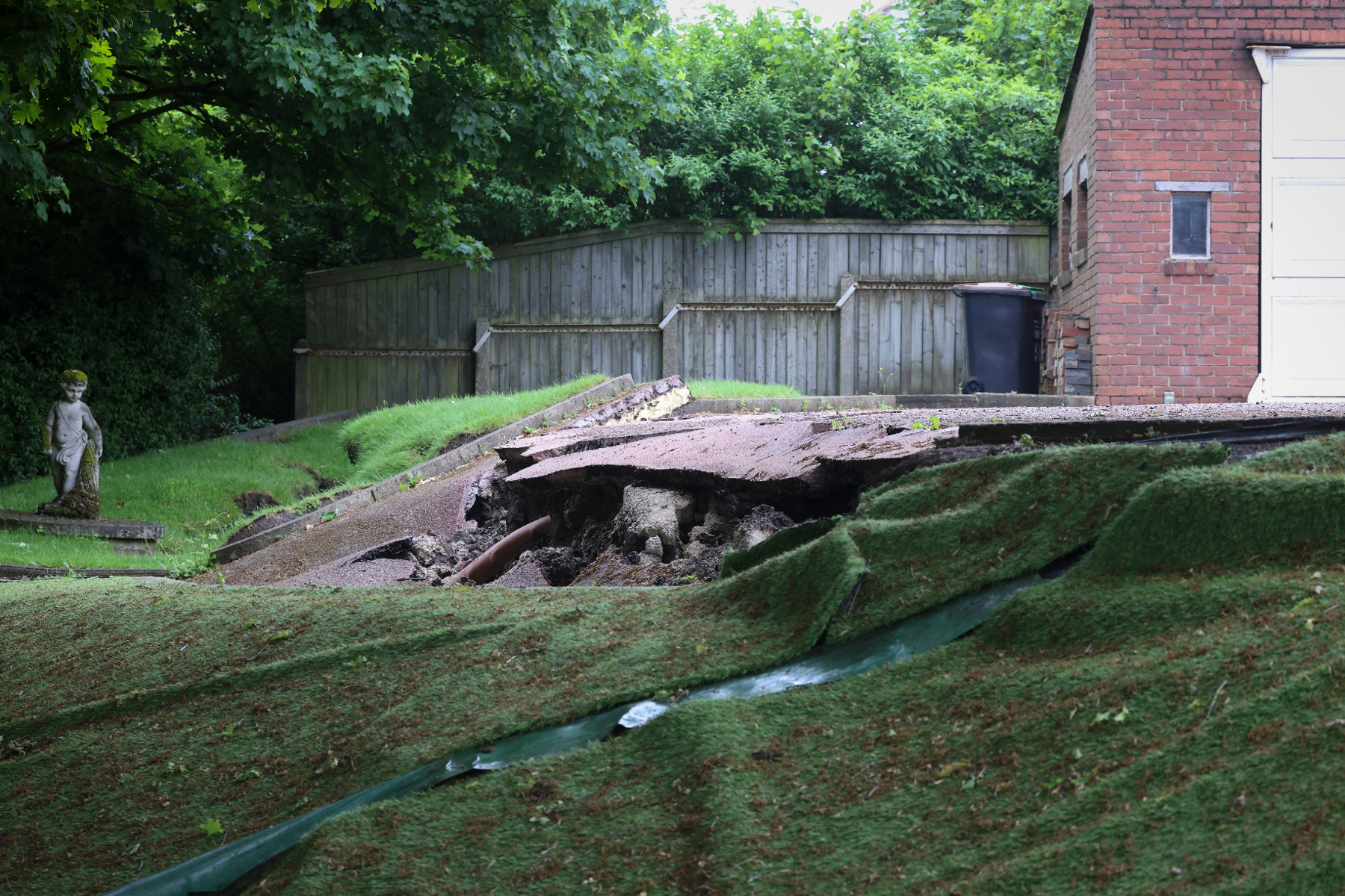 When Susan Tighe, 81, woke up on May 23 she found a chasm forming in her garden