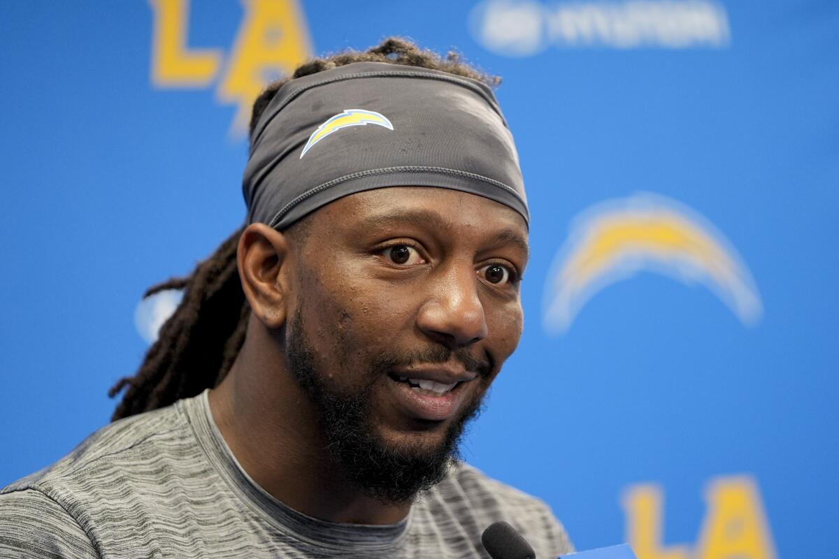 Chargers linebacker Bud Dupree speaks during a news conference.