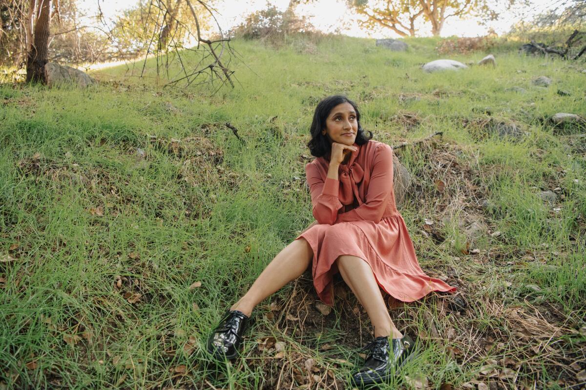 Woman sitting on the grass