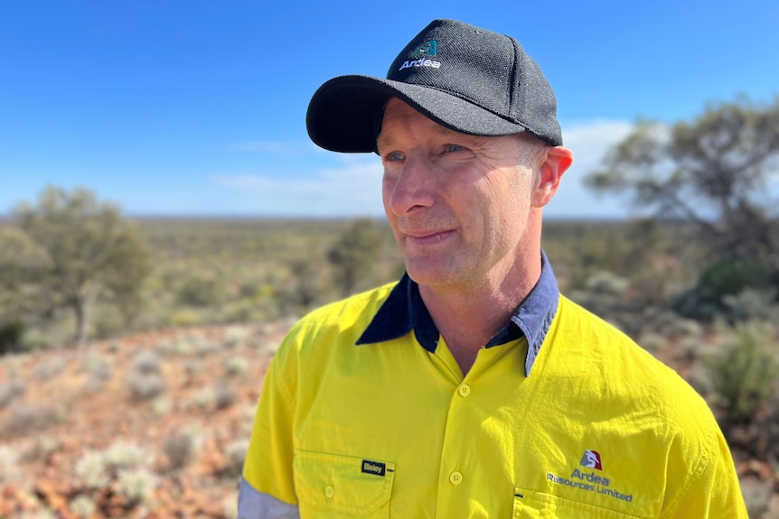 man wearing hi-vis in the desert