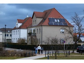 Solar panels on the roof a house in Schwedt, Germany. Photographer: Krisztian Bocsi/Bloomberg