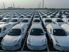 Geely Automobile Holdings Ltd.'s Zeekr electric vehicles bound for shipment to Europe at the Port of Taicang in Taicang, Jiangsu Province, China, on Thursday, Aug. 24, 2023. Geely, one of China's largest independent carmakers, posted first-half earnings that beat estimates, weathering a price war that continues to hit the industry. Bloomberg