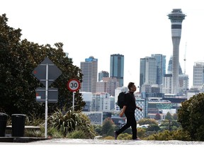 A morning commuter on Ponsonby Road in Auckland, New Zealand, on Monday, April 8, 2024. New Zealand's economy may be headed for a hard landing after business confidence slumped in the first quarter, the NZ Institute of Economic Research said. Photographer: Fiona Goodall/Bloomberg