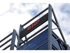 The BHP Group Ltd. logo atop Brookfield Place in Perth, Australia. Photographer: Philip Gostelow/Bloomberg