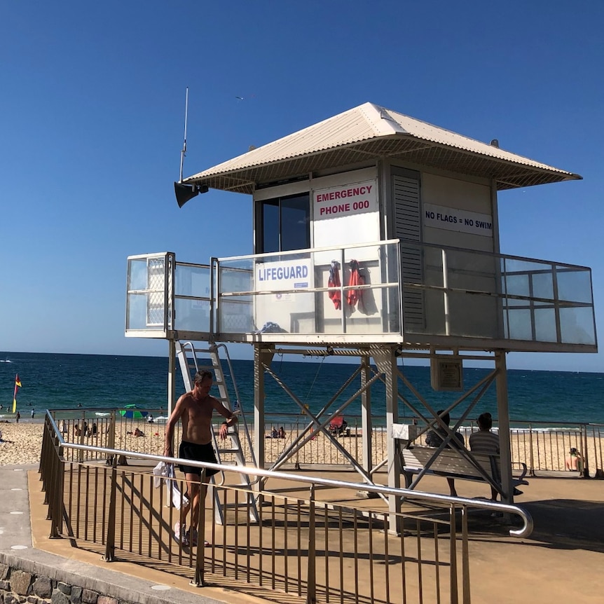 A building on a beach on a sunny day