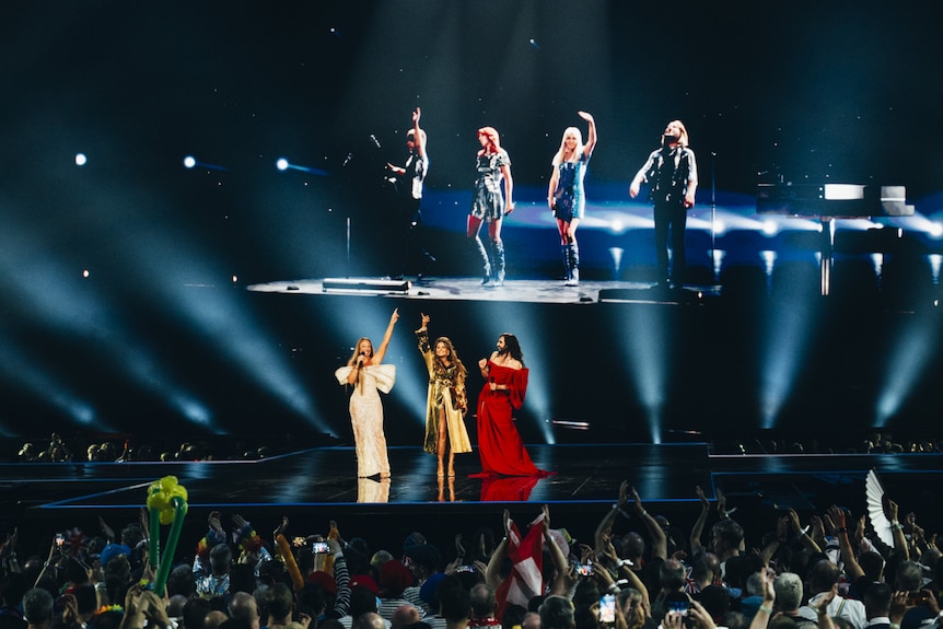 ABBA-tars and performers on stage