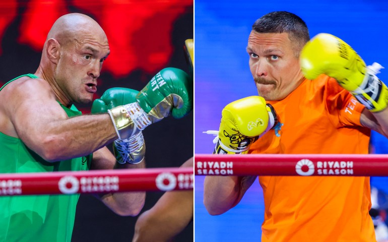 Two boxers training in the gym.